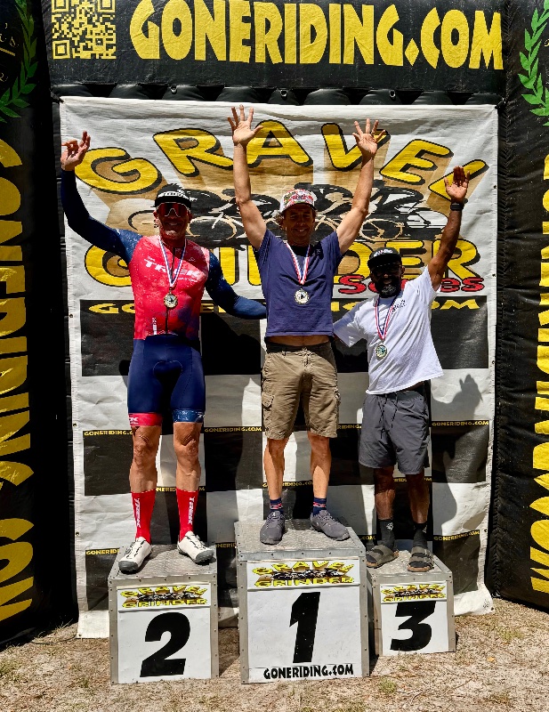 Saswata Roy on a gravel race podium